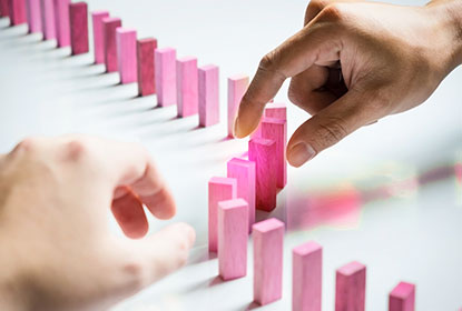 Digital Marketing agency Dubai hand on pink blocks